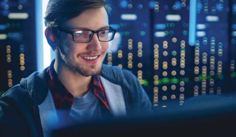 big data student looking at computer screen